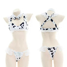 Cow print bikini set on mannequins with a white background