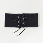 Black lace-up top on a white background