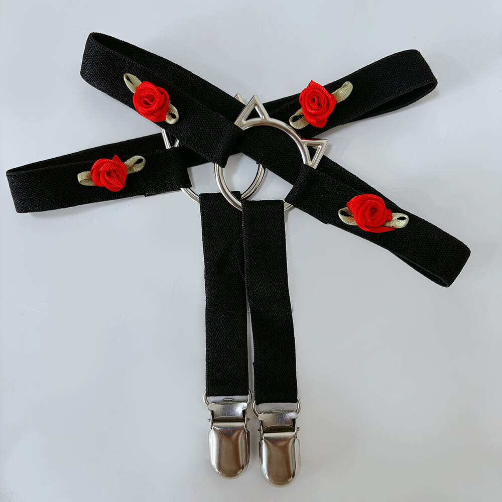 Black garters with red rose decorations on a white background