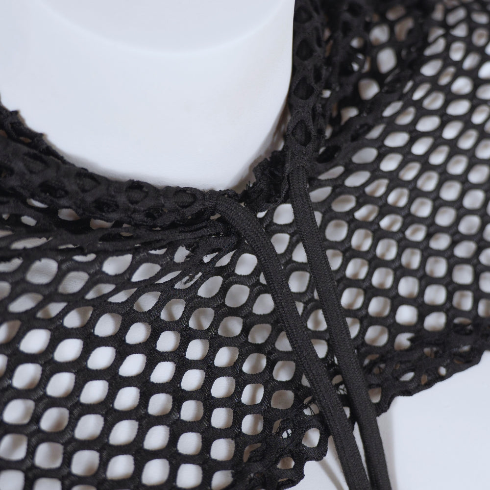 Black mesh fabric with a white background