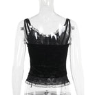 Black gothic zip-up corset top on a mannequin with a white background
