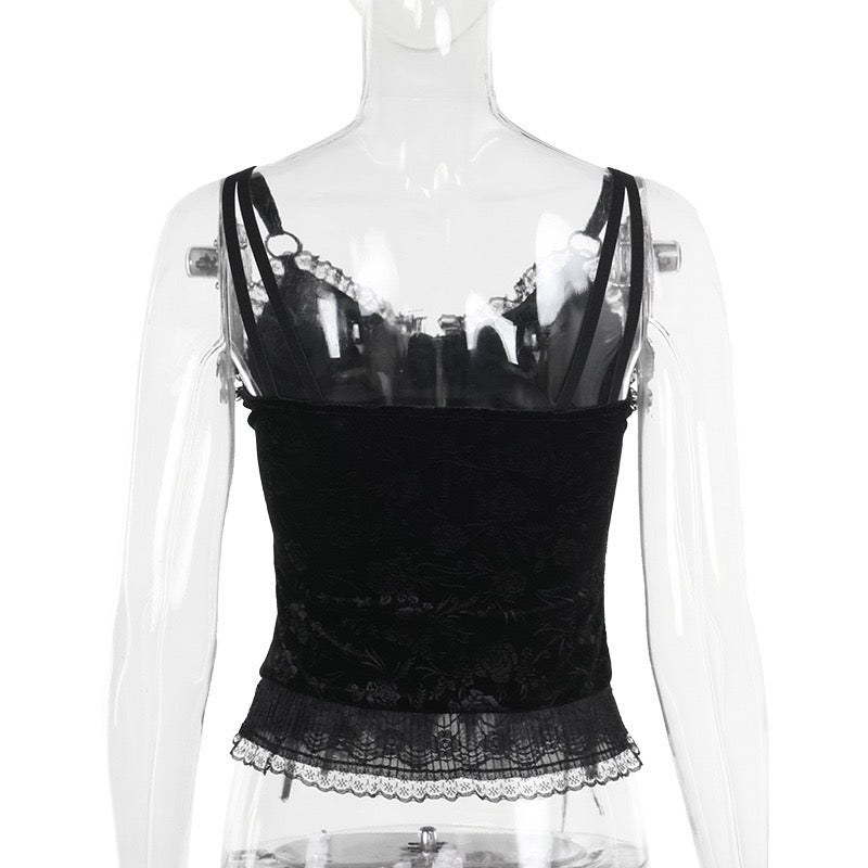 Black gothic zip-up corset top on a mannequin with a white background