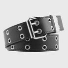 Black leather belt with silver eyelets on a light gray background