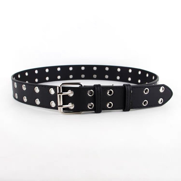 Black leather belt with silver studs and grommets on a white background