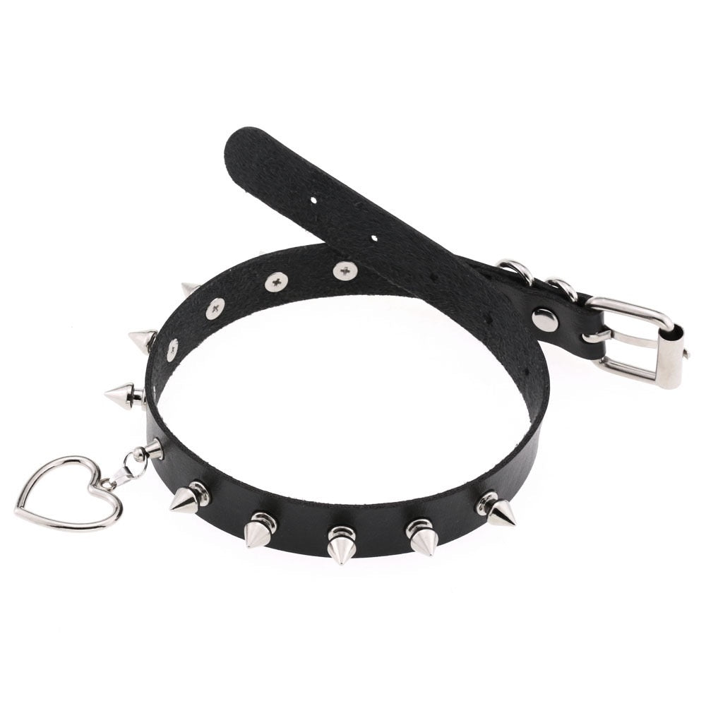 Black belt with silver studs and heart-shaped buckle on a white background