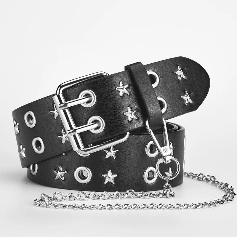 Black leather belt with silver star and round studs on a light gray background
