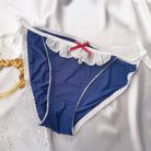 Navy sexy maid tie side thong panty with red bow on a white background