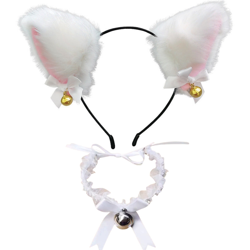 White faux fur bunny ears headband with pink inner lining, white bows, small gold bells, and a matching white ruffled collar with a silver bell and ribbon, shown on a plain white background.