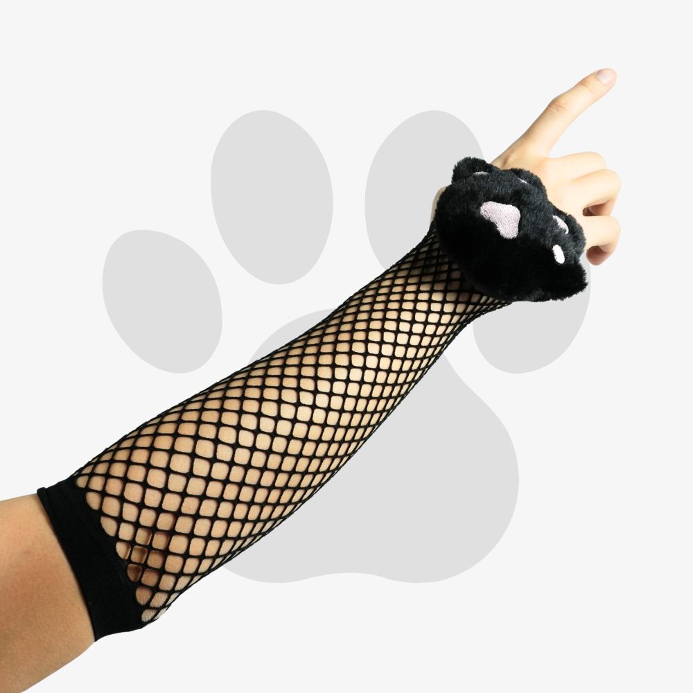 Black fishnet glove with cat paw plushie on a white background