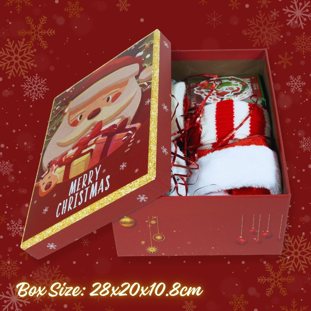 Open Christmas gift box with Santa Claus design and a red and white striped item on a red background with snowflakes.