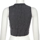Dark gray textured vest on a mannequin with a white background