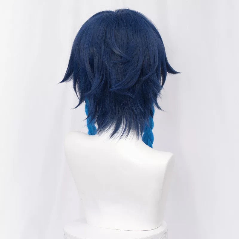 Blue wig on a mannequin head against a white background