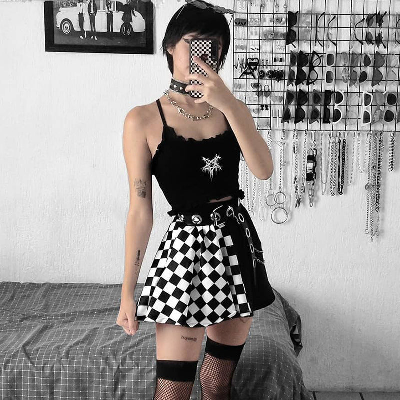 Femboy in black and white plaid colorblock skirt
