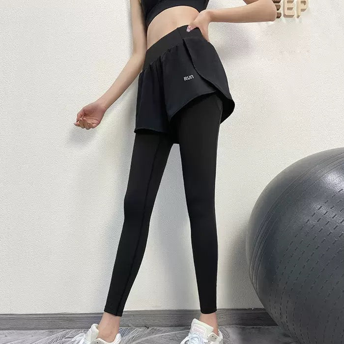 femboy in black elastic leggings with pockets