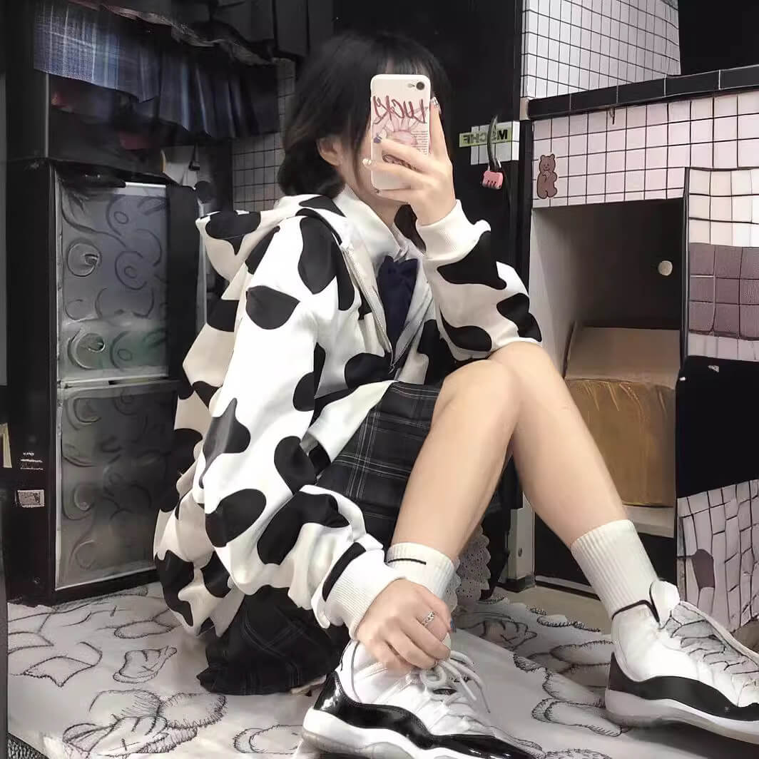 Femboy in cow print zip up hoodie