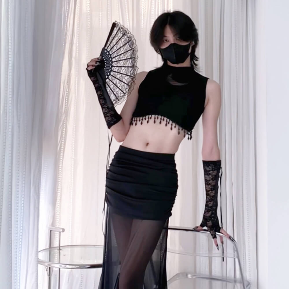 Femboy in black moon sleeveless crop top