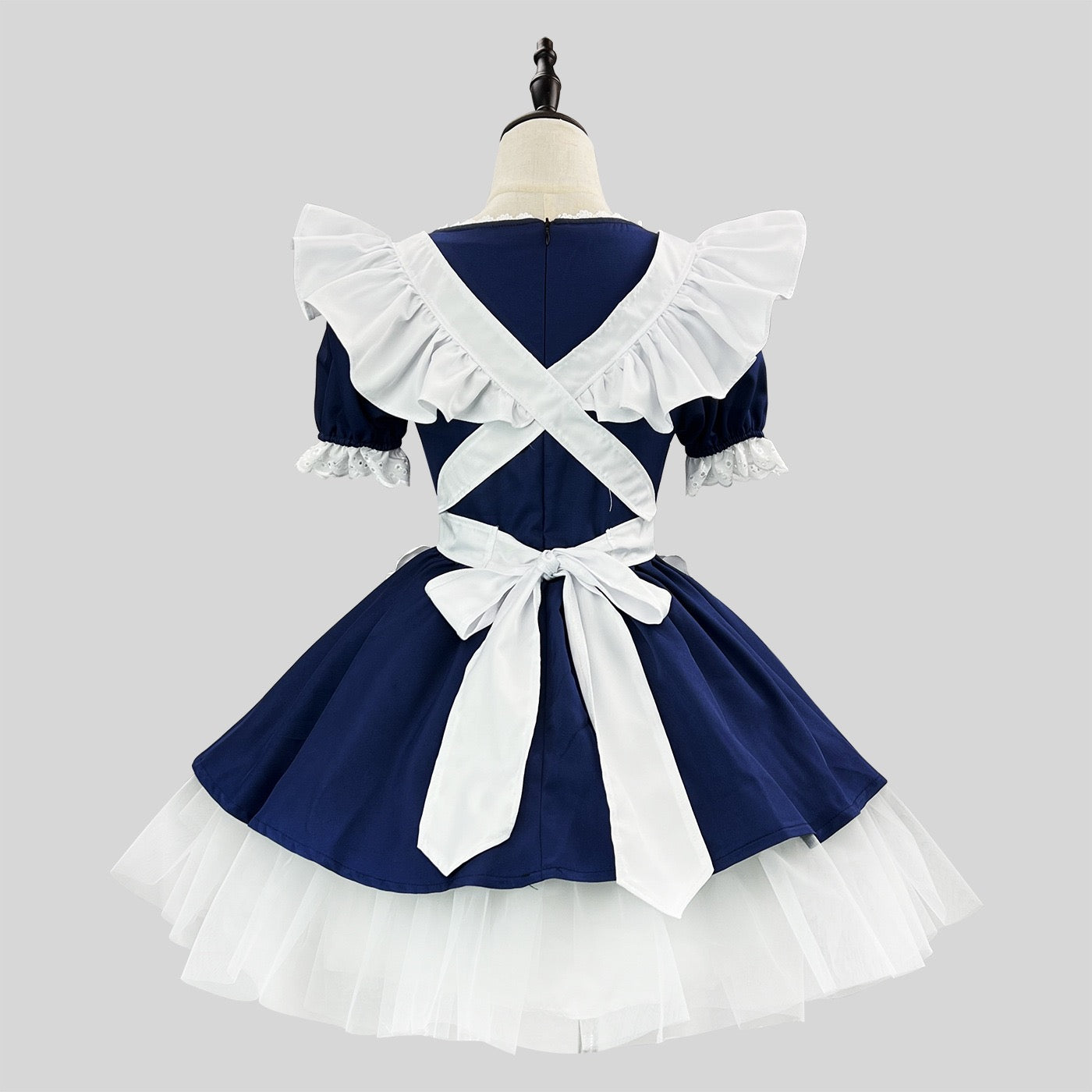 Femboy in a navy cosplay lolita maid dress
