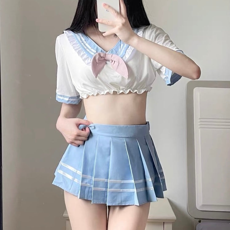 Person wearing a pastel blue cute school girl lingerie set taking a mirror selfie.