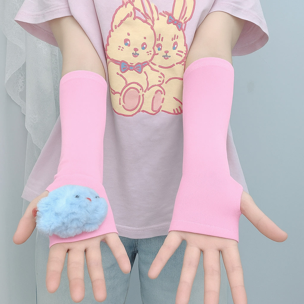 Femboy in pink arm warmers