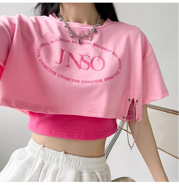 Femboy in pink fashion tank top with crop top