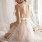 Femboy in sexy white bride lingerie back