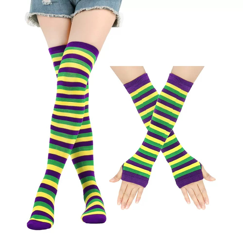 Striped knee-high socks and arm warmers in purple, green, and yellow on a white background.