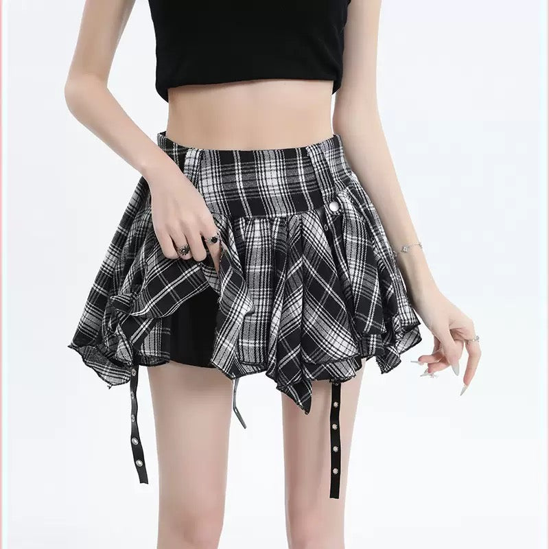 Femboy wear a high waisted black and white plaid skirt and black car ear hoodie back