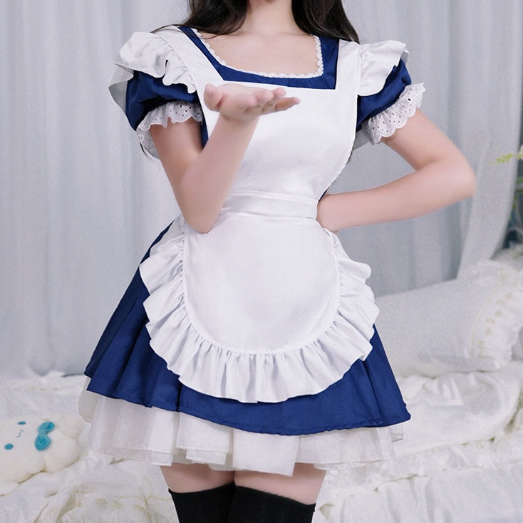 Femboy in a navy cosplay lolita maid dress