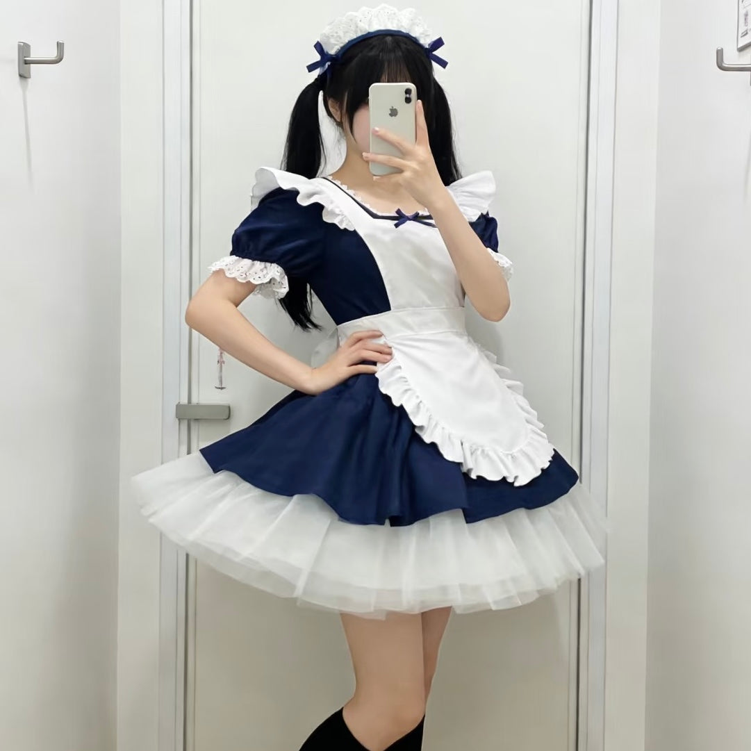Femboy in a navy cosplay lolita maid dress