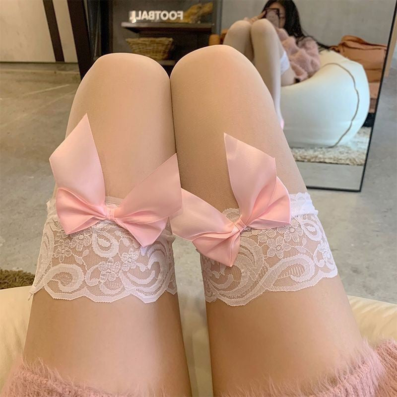 Femboy wear pink lace high thigh stockings with big bow
