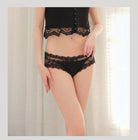 Femboy wear sexy see through floral lace crotchless panties front