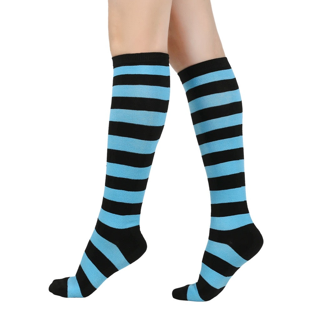 Black and blue femboy striped knee-high socks on a white background