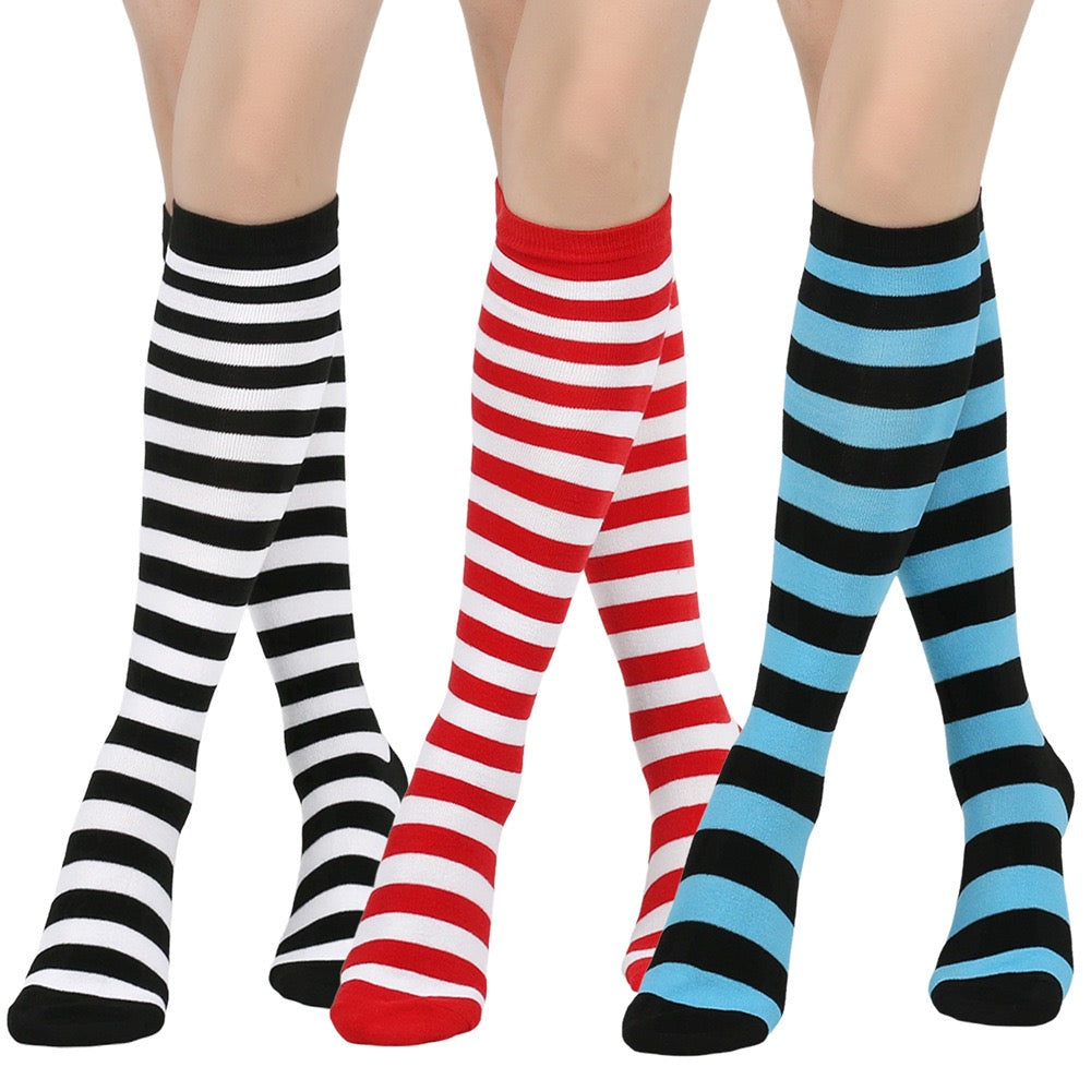 Three pairs of striped knee-high socks in black and white, red and white, and blue and black on a white background.