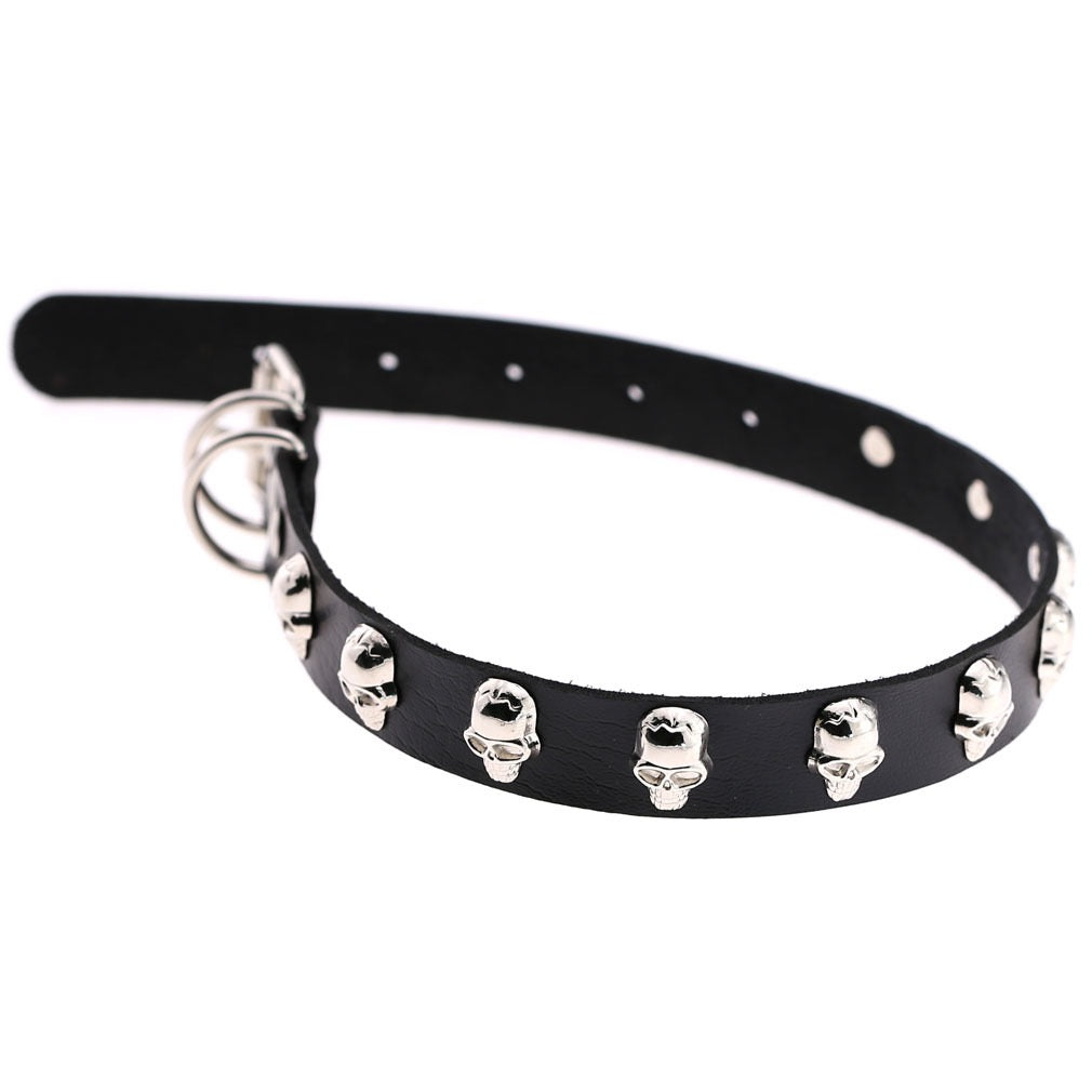 Black leather choker with silver skull studs on a white background