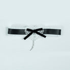 Black sweet lolita maid choker on a light gray background