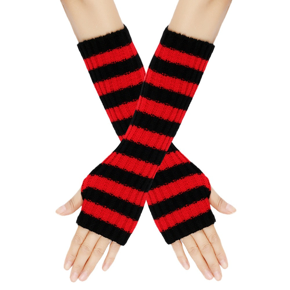 Red and black striped arm warmers on a white background