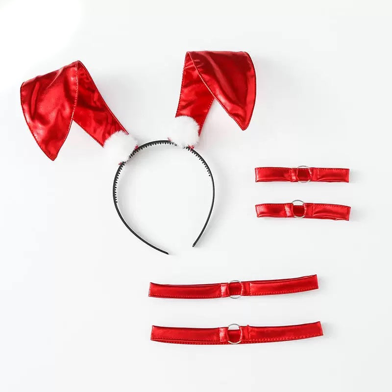 Red satin headbands and belts on a white background