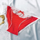 Red sexy maid tie side thong panty on a light gray background