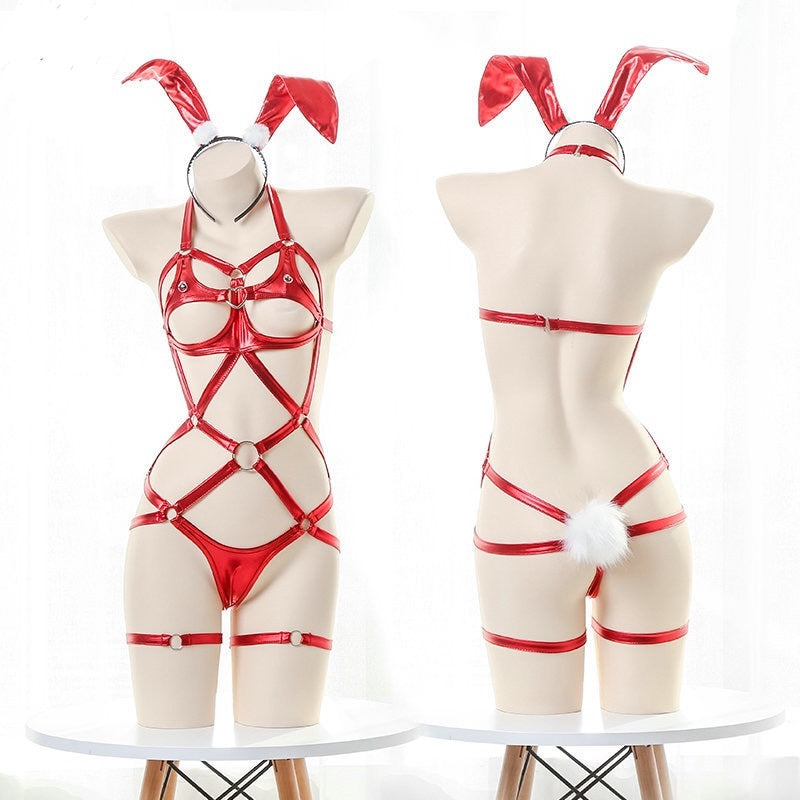 Red bunny costume with harnesses on mannequins against a white background