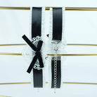sweet lolita maid choker with black ribbons and decorative elements on a white background
