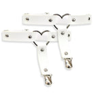 White leather garters with metal hardware on a white background
