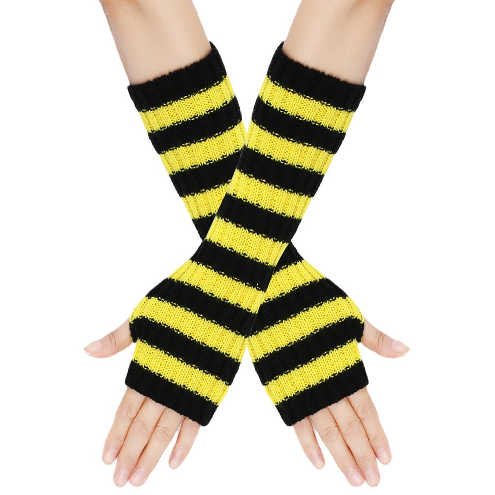 Black and yellow striped arm warmers on a white background