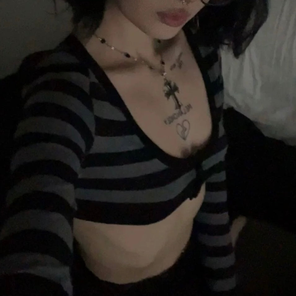 Femboy in black and grey striped long sleeve crop