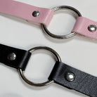 Leather o ring choker on a white background