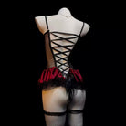 Mannequin wearing a black and red lace lingerie set on a black background