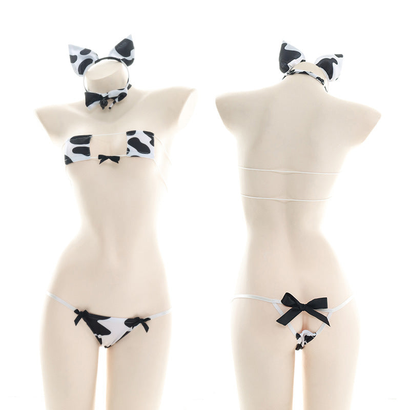 Black and white cow print micro bikini set front and back