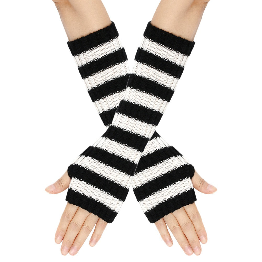 Black and white striped arm warmers on a white background