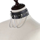Black gothic leather studded choker with chain on a mannequin head.
