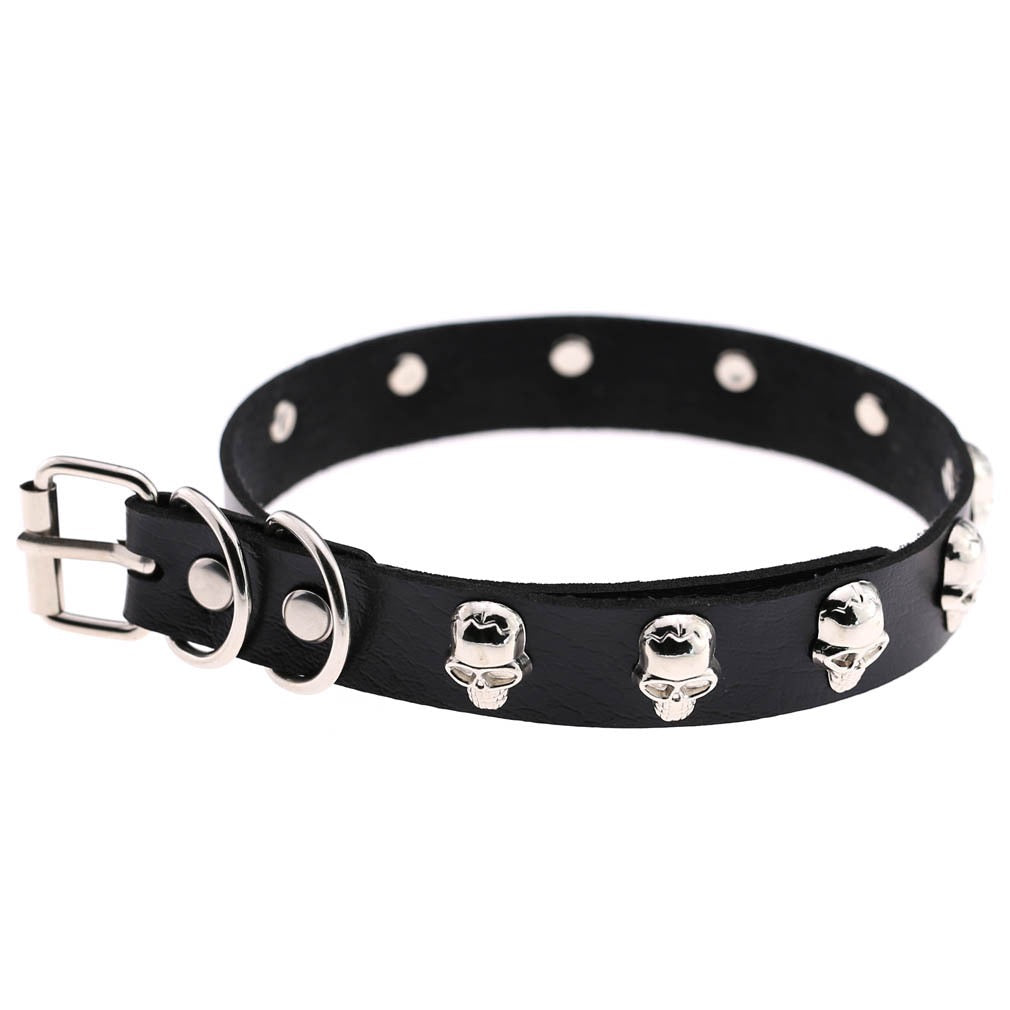 Black leather choker with silver skull studs on a white background