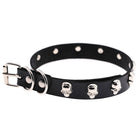 Black leather choker with silver skull studs on a white background